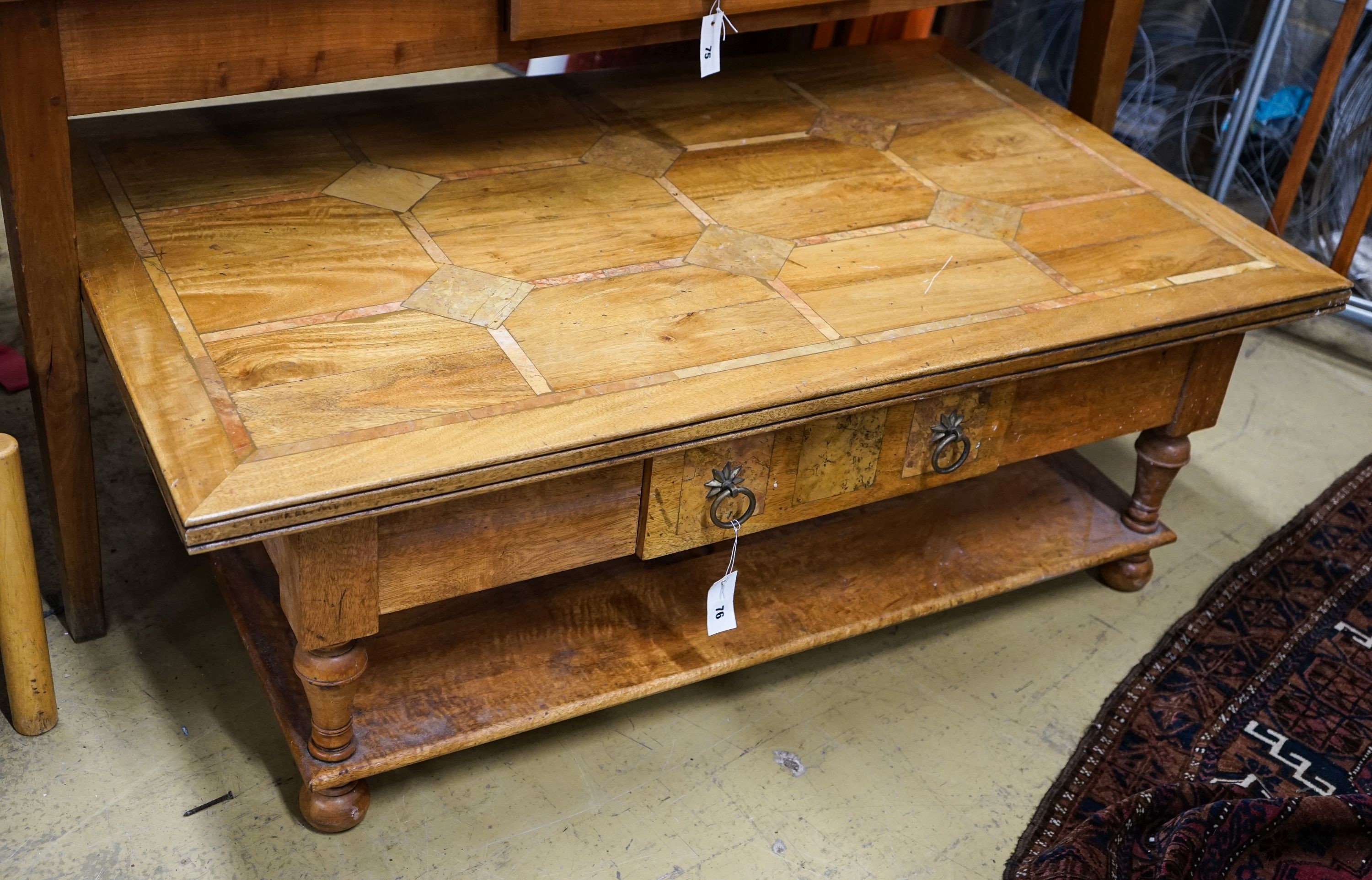 A rectangular parquetry inlaid walnut two tier coffee table, length 130cm, depth 80cm, height 45cm